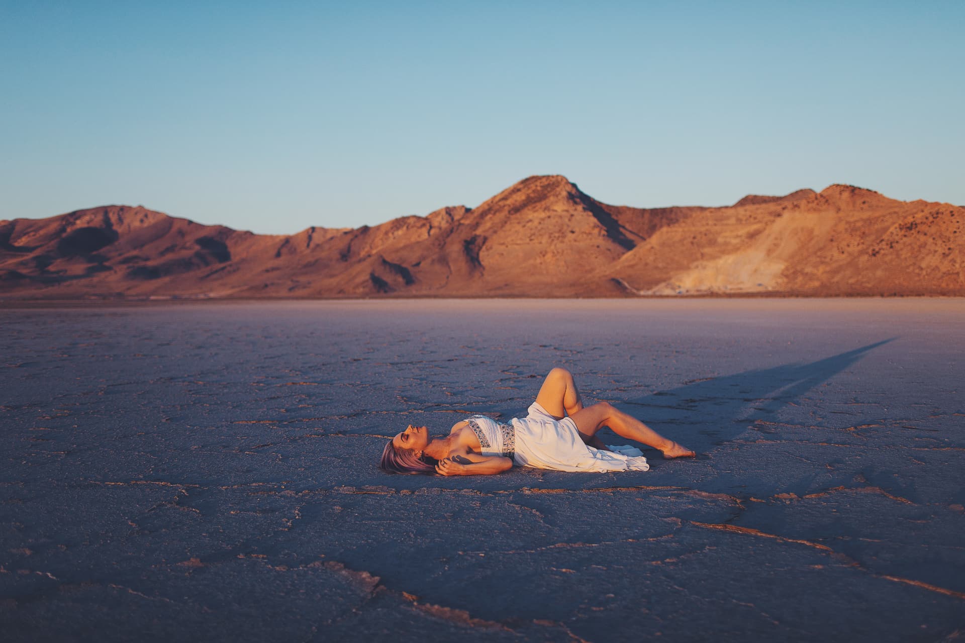 Natasha Jane Julian on the salt flats at golden hour